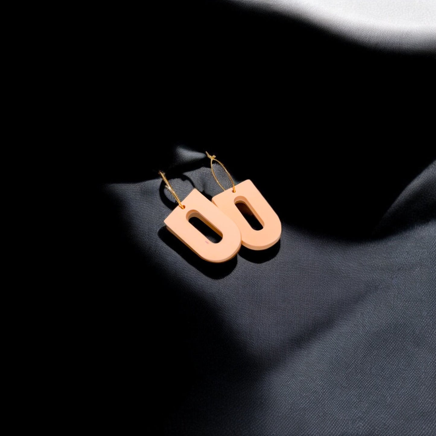 Boucle d'oreille orange en jesmonite
